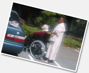 caring giver assisting a senior